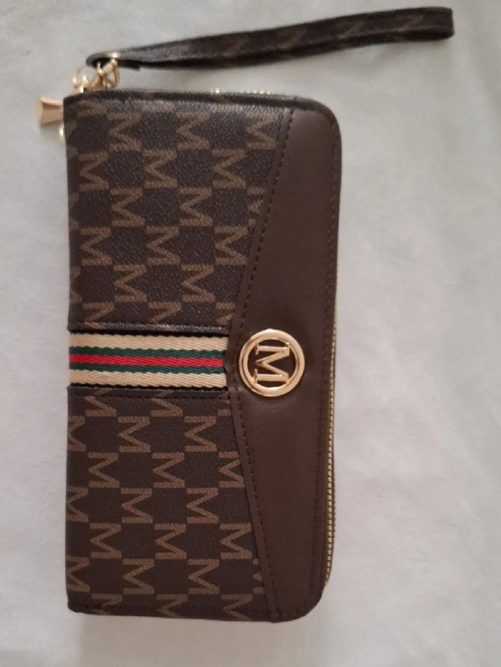 Brown Monogram Wristlet Wallet with Striped Accent and Gold Logo